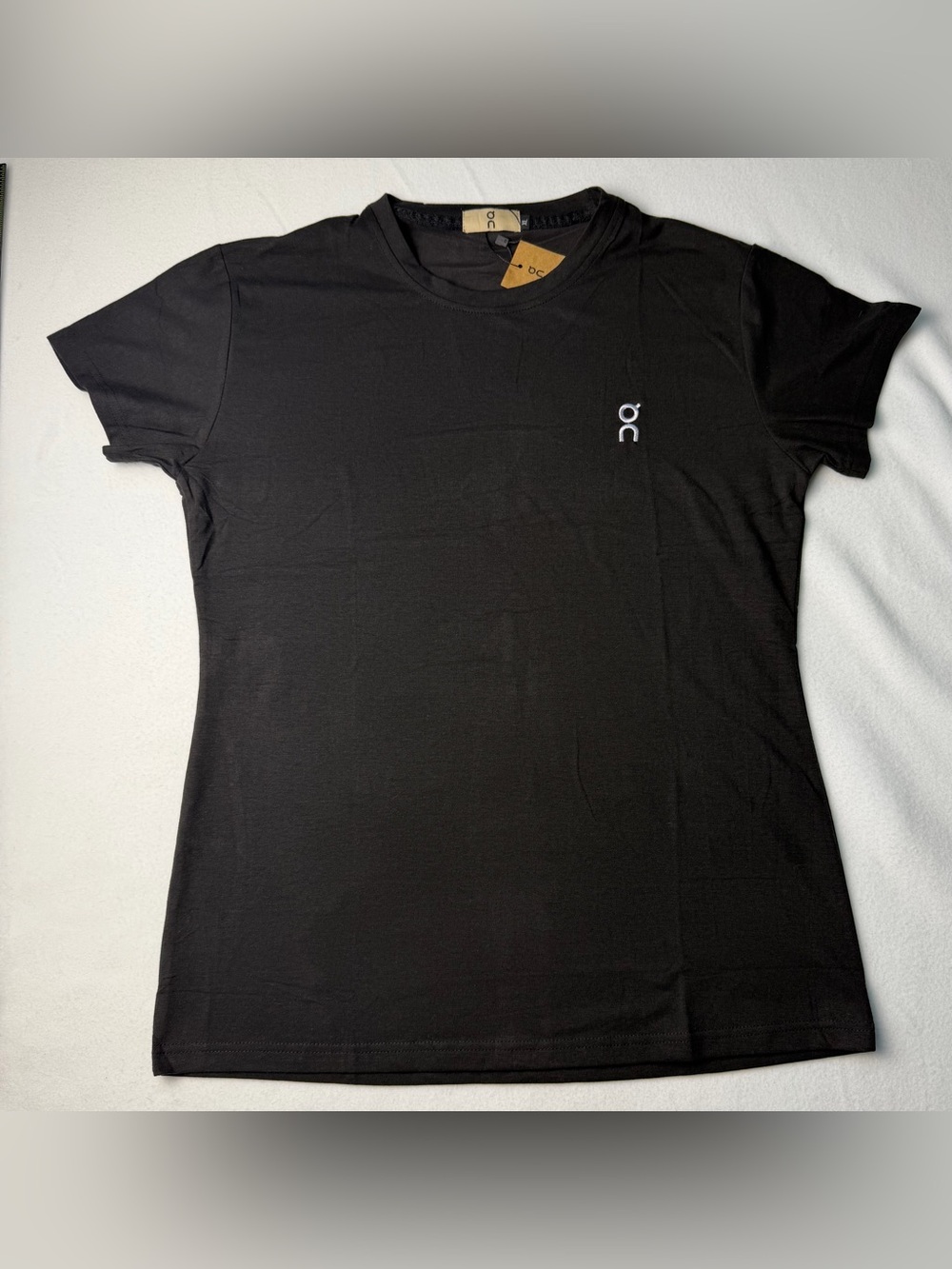 On Running Women's Black Short Sleeve Performance Tee